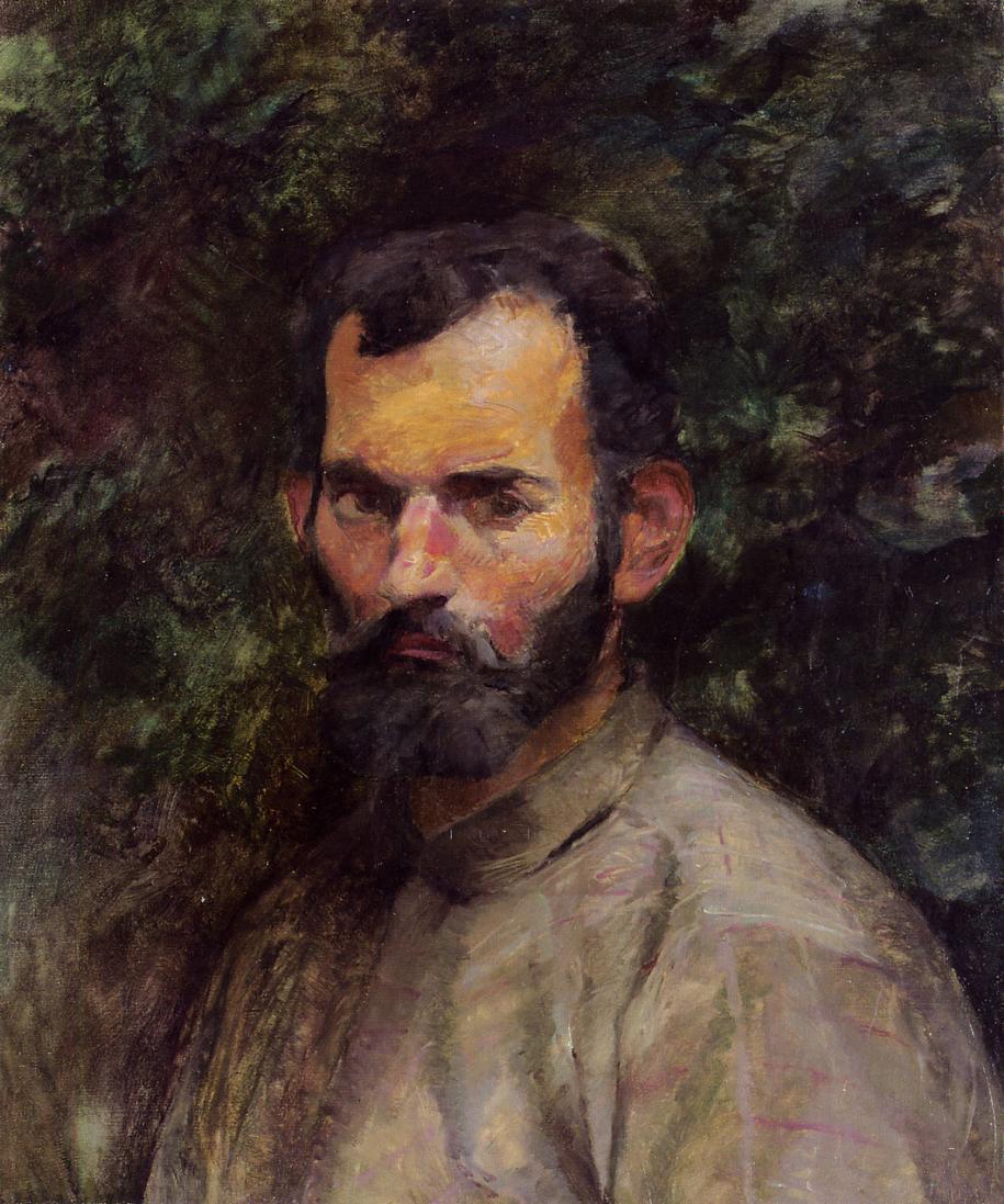 Portrait of young bearded man in simple shirt